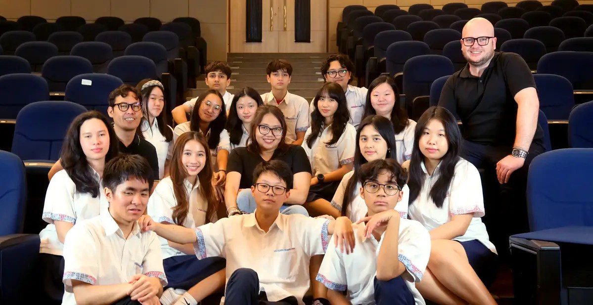 North Jakarta Intercultural School's IB Diploma students and teachers in the school auditorium